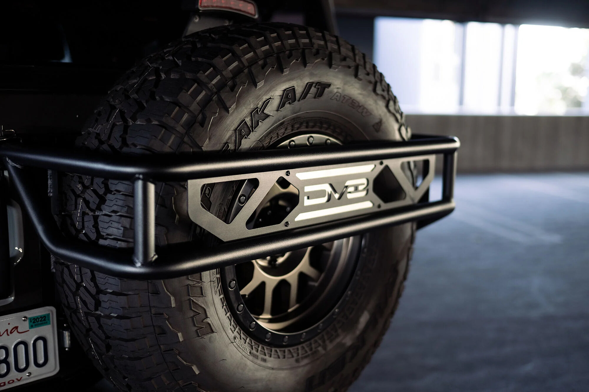 DV8 Offroad TCBR-01 Spare Tire Guard & Accessory Mount for 21-26 Ford Bronco