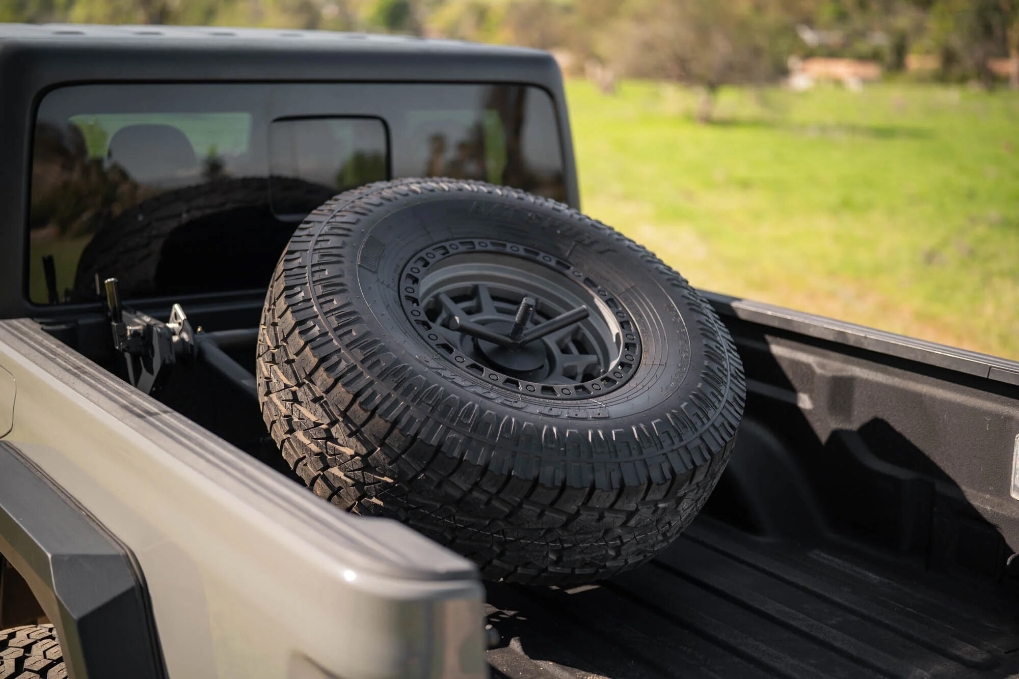 DV8 Offroad TCGL-03 Adjustable In-Bed Spare Tire Carrier for 20-26 Jeep Gladiator JT